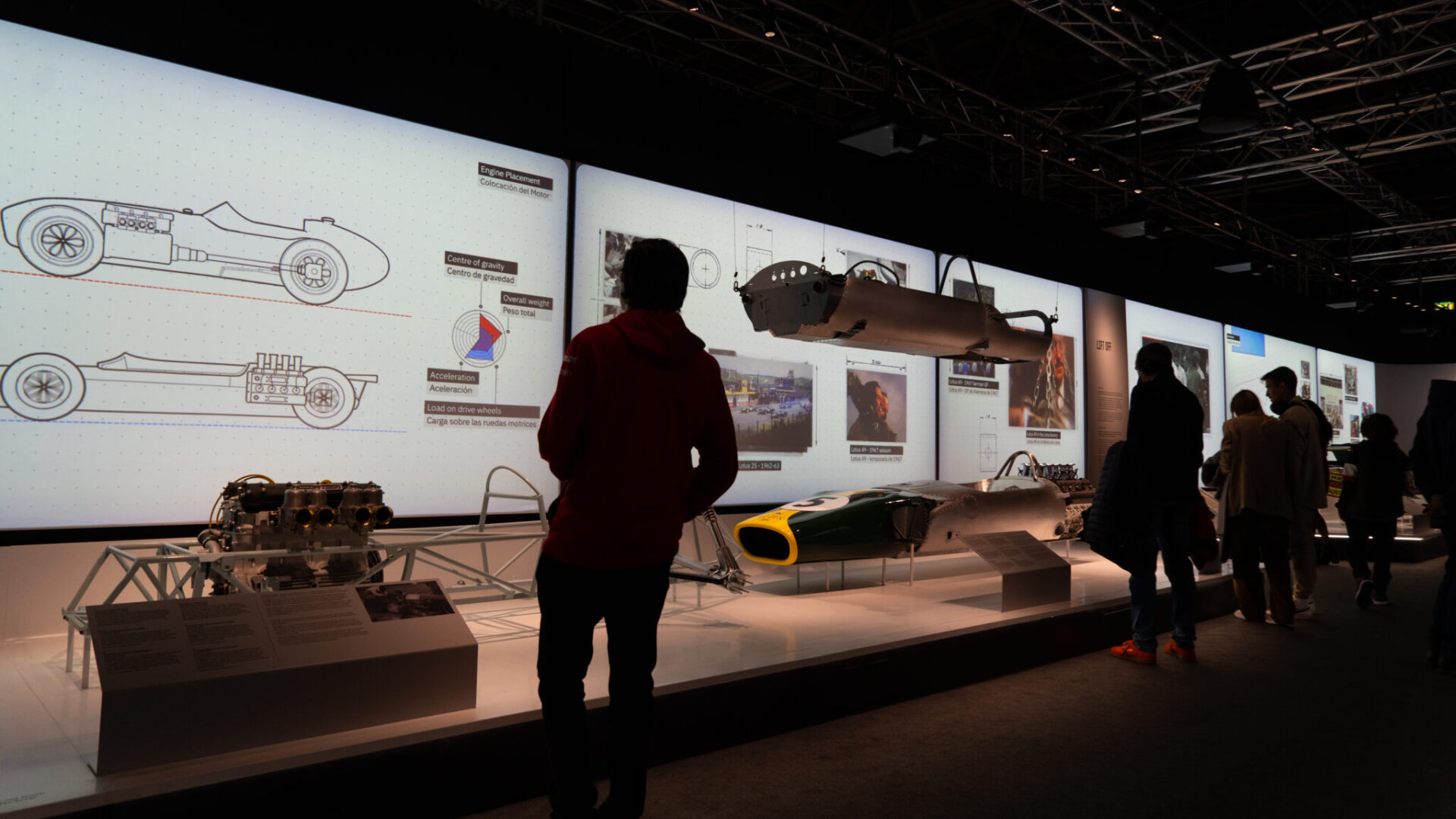 Visitors inside F1 The Exhibition immersive brand destination by Journey.