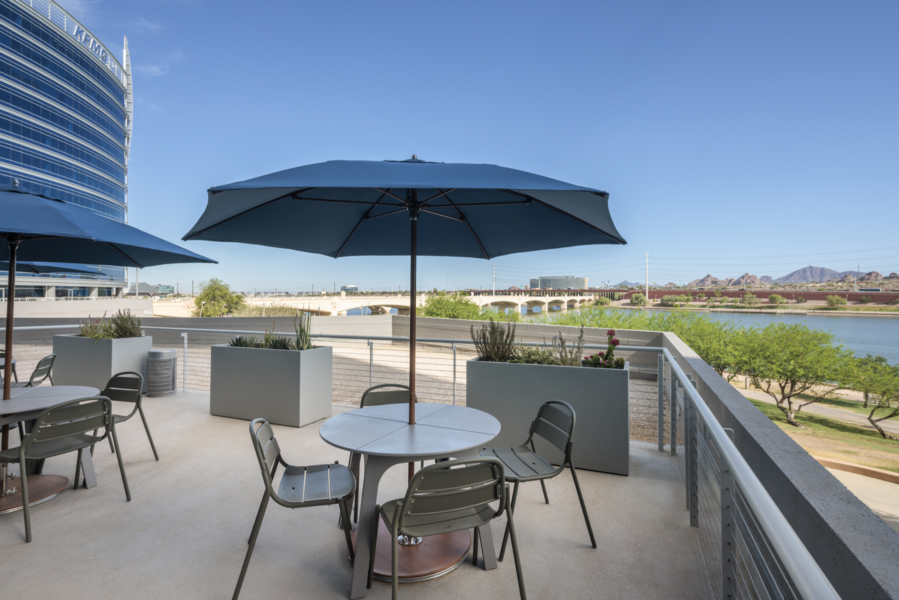 The rooftop terrace at CLA's Tempe Connection Center at dusk, overlooking Tempe Town Lake
